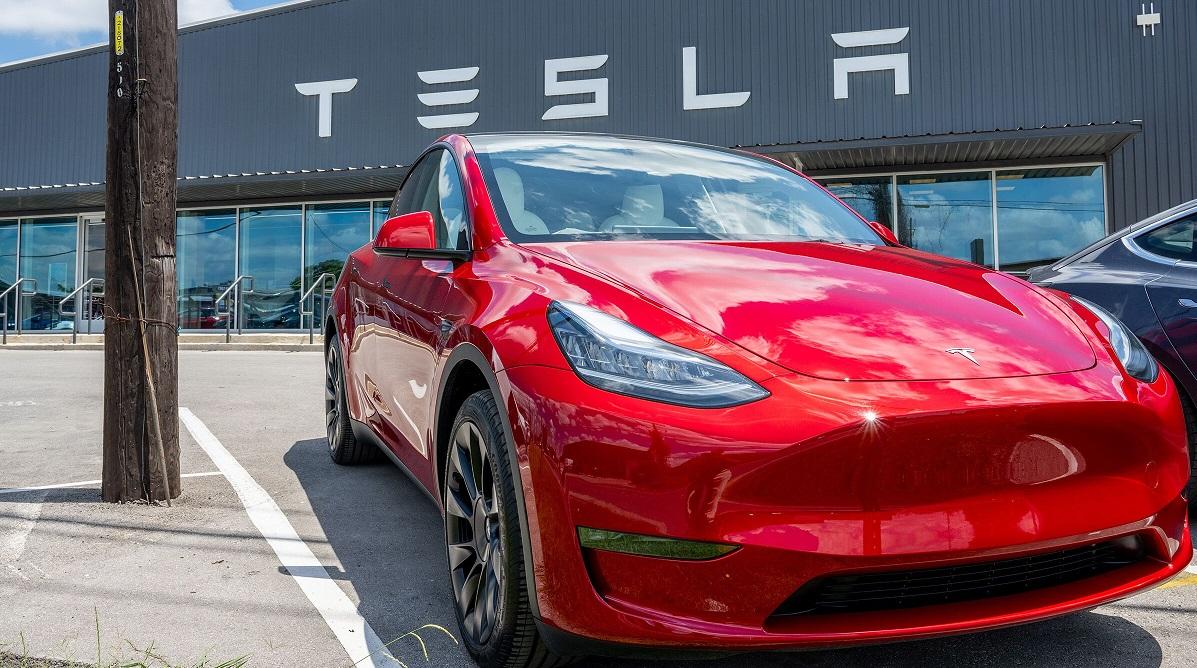 Tesla flags 'notably lower' growth as it builds low-cost car