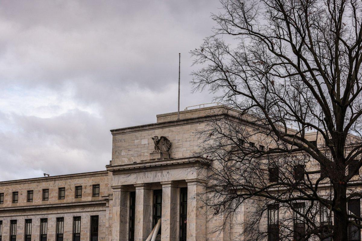 US Fed sees rates staying high for some time with cuts eyed in 2024