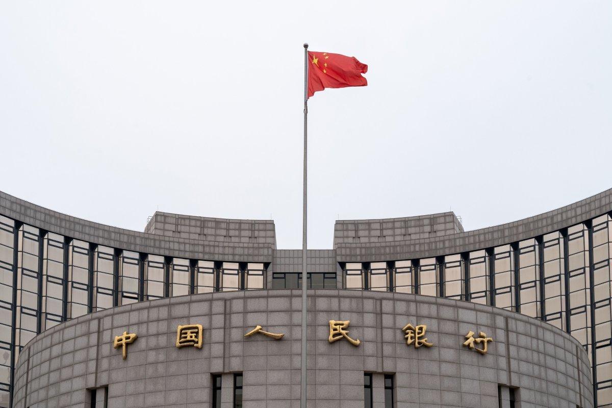 China to cut bank reserve ratio in bid to boost growth, markets